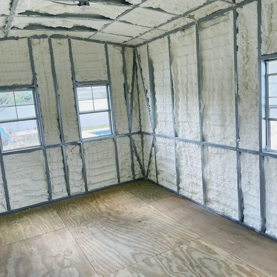 Closed-cell spray foam insulation applied to wall cavities in a residential project in Ossining