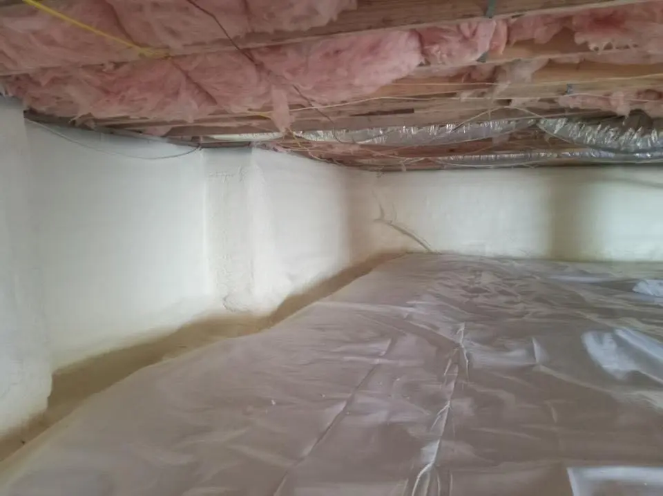 Crawl space encapsulation with closed-cell spray foam for Commercial Roof Restoration in Ossining